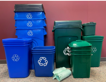 picture of blue and green recycling cans