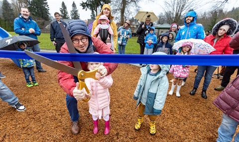 Maplewood-Park-ribbon-cutting-with-Mayor-Armondo-Pavone-and-families-in-the-background.jpg