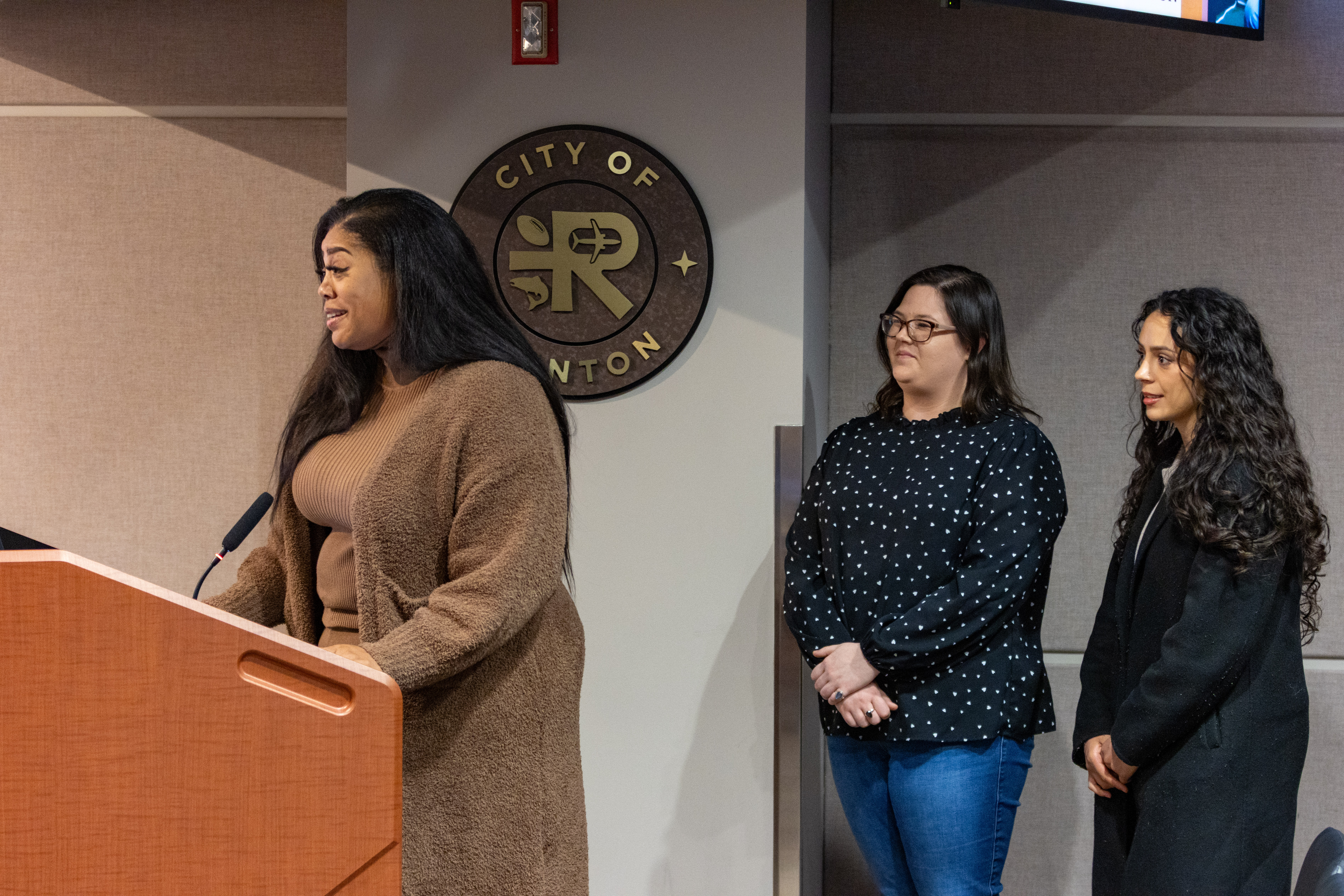YWCA-Director-of-Health-and-Safety-Arnell-Wilkerson-King-accepting-Womens-History-Month-Proclamation-with-coworkers.jpg