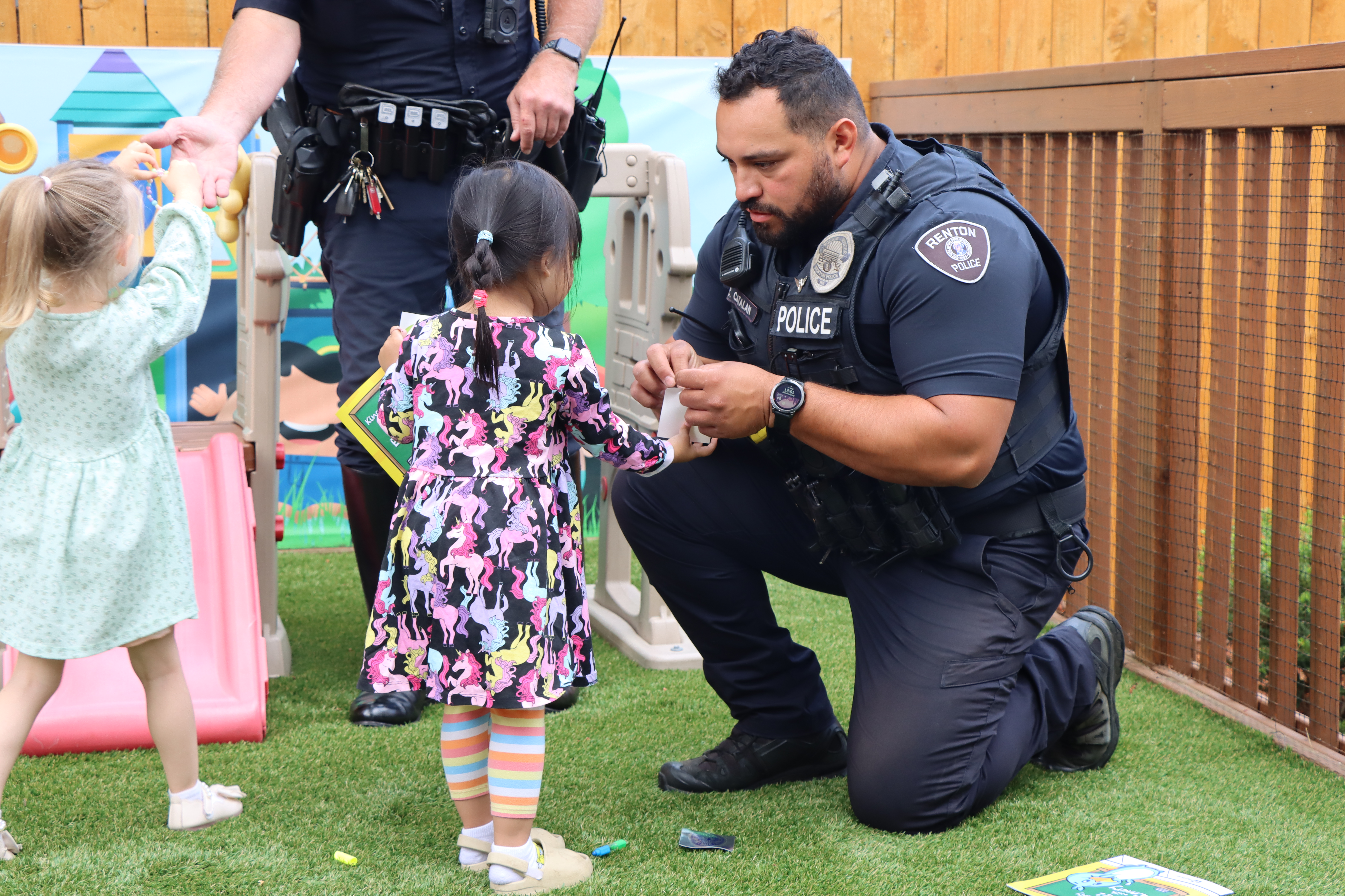 Officer and young child