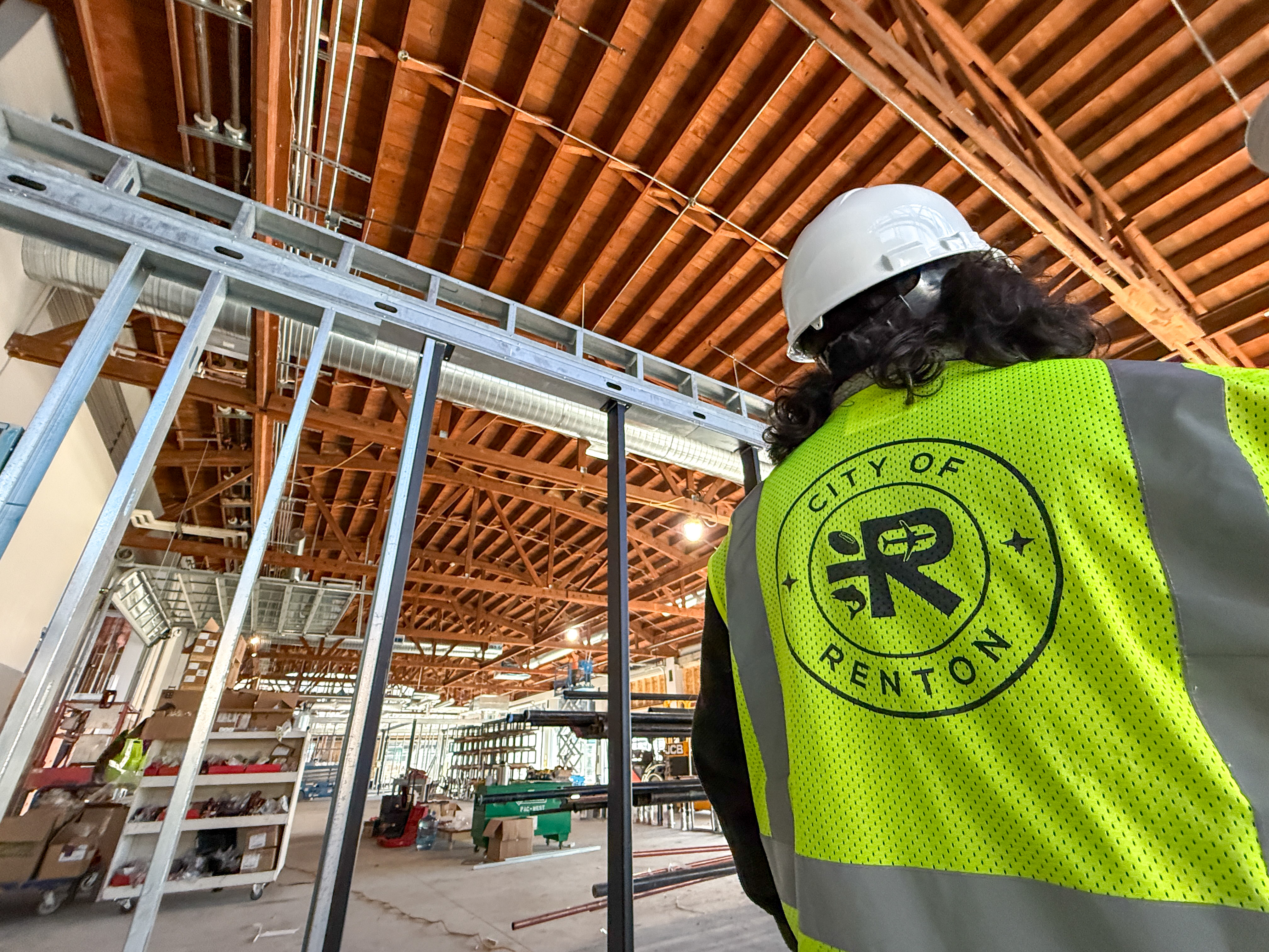 Image of construction at Renton Market and staff in construction zone