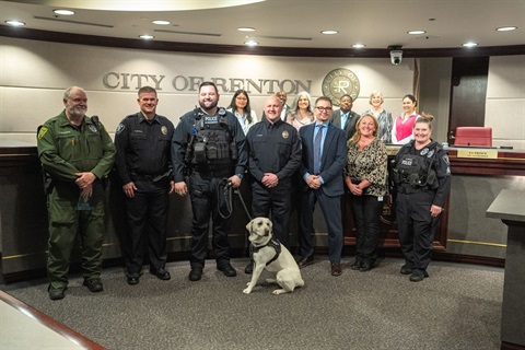 2026-04-06 Renton Police group photo at City Council meeting with wellness dog Oakley