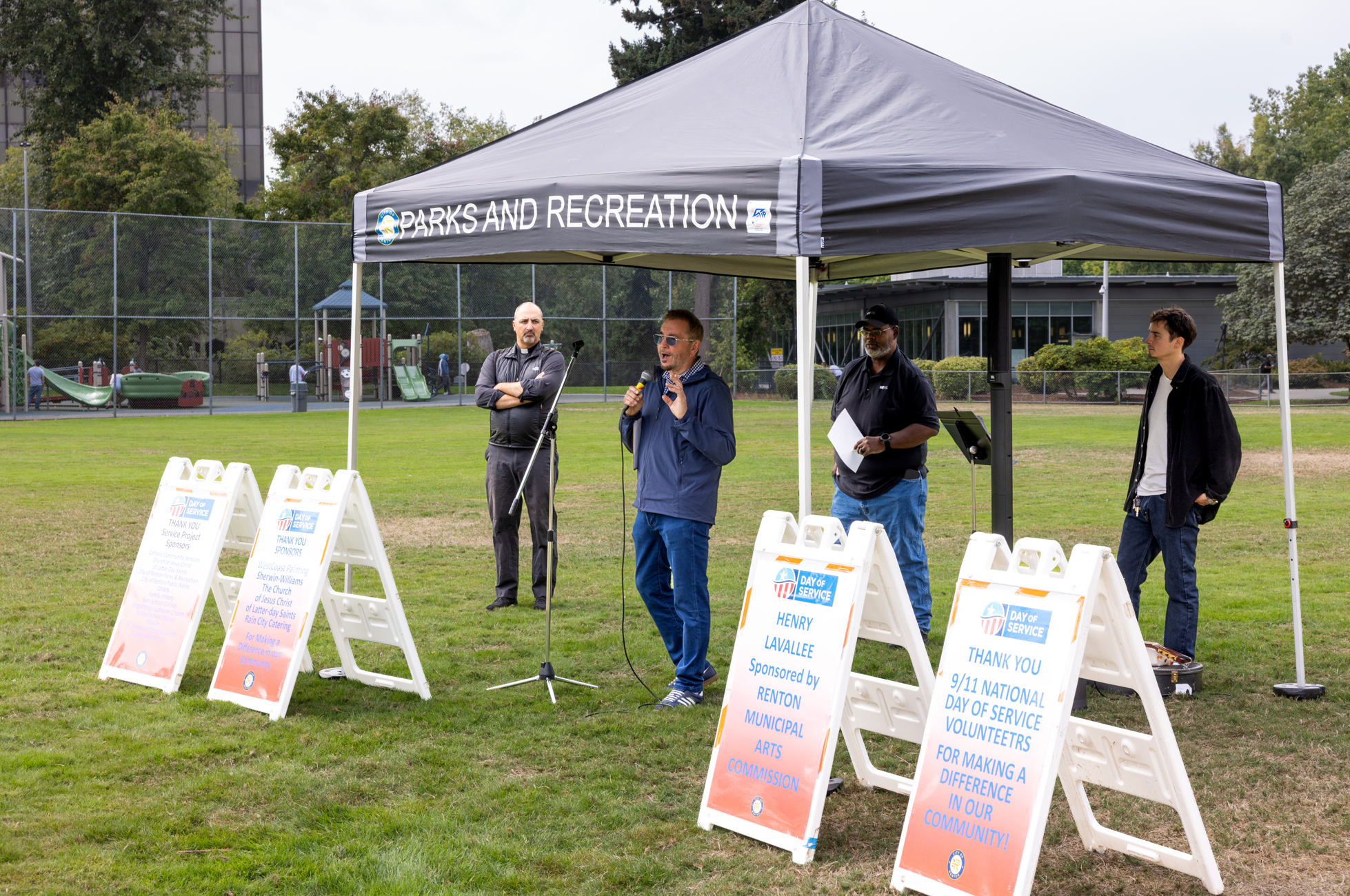 Mayor Armondo Pavone and thank you signage at Liberty Park during National Day of Service picnic