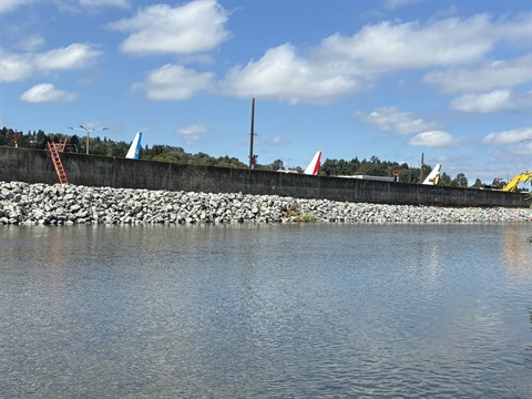 Cedar River levee restored on a partly cloudy day. renton airport in the background.jpg